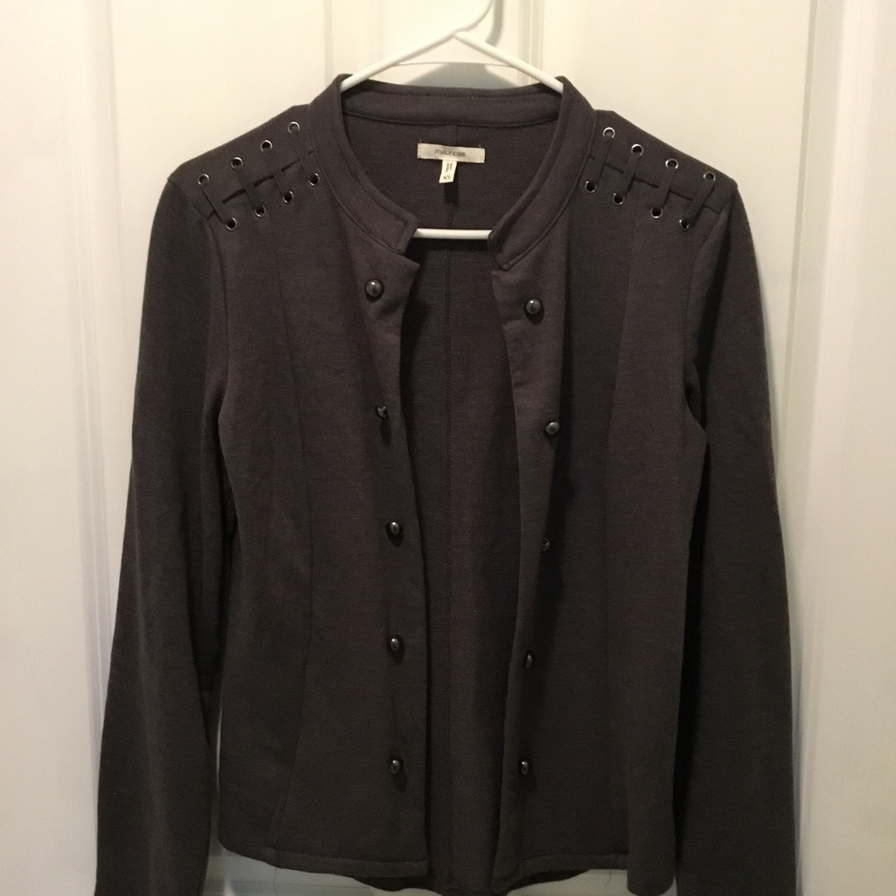 Maurice’s grey jacket/top